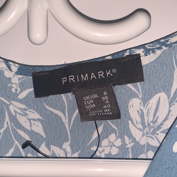 Blue Floral Peplum Top - Picture 3 of 5